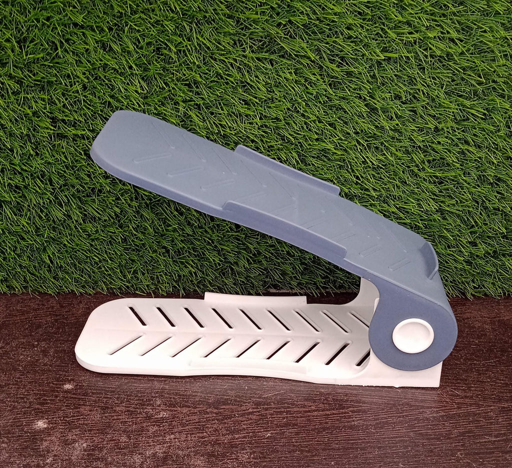 A single adjustable shoe organizer in a neutral color, showcasing its simple and functional design.