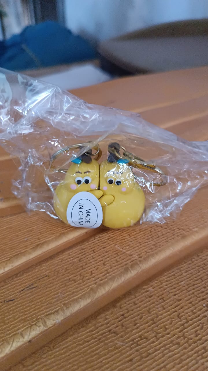 Neutral image showing Cute Cartoon Couple keychain set