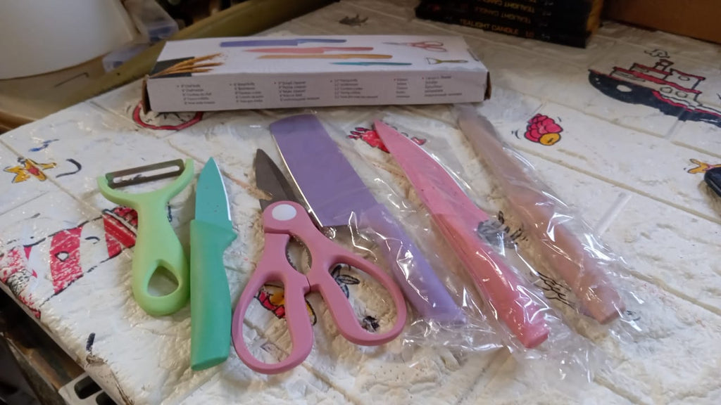 The branded packaging box for the CookAura 6-piece corrugated kitchen knife set.