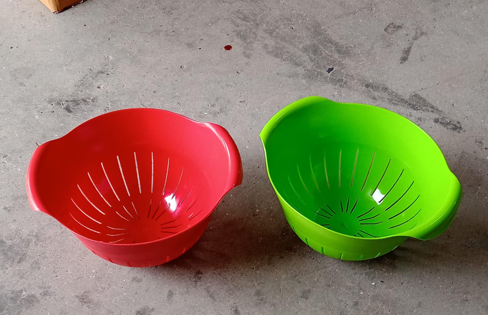Overhead view of the compact rice washing bowl ready for kitchen use.