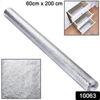 Kitchen wall protected by heat-resistant aluminum foil wallpaper.