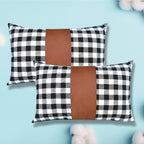 Versatile leather and cotton pillow cover, perfect for various home settings.
