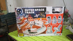 Packaging of the Space Race Track Set showcasing its key features.