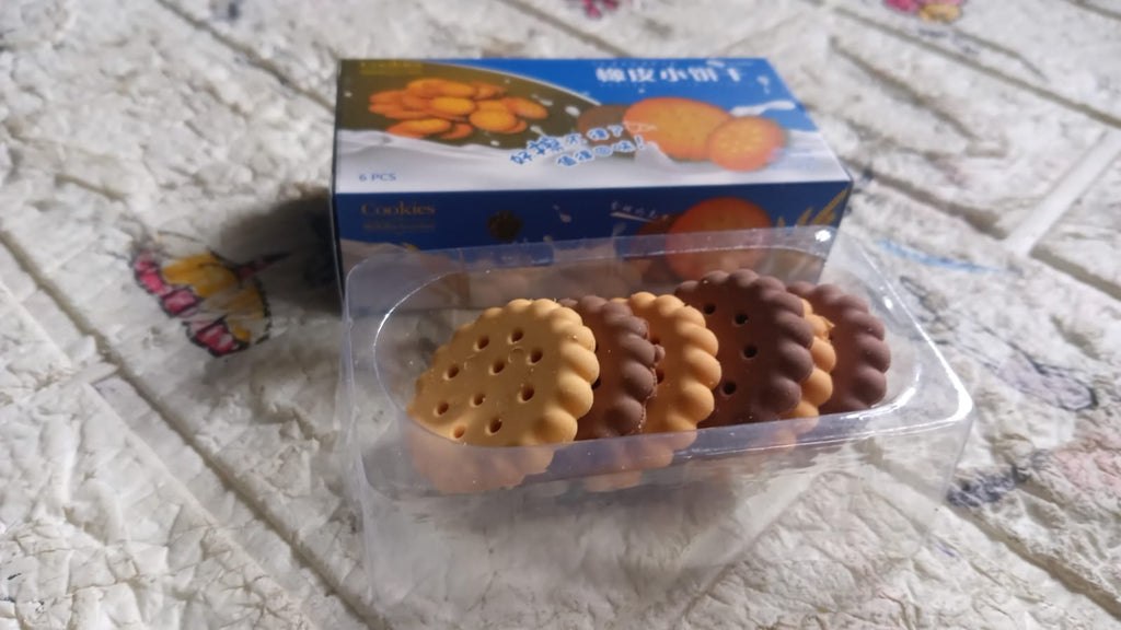 Creative display of multiple biscuit-shaped erasers, ideal for children's stationery.