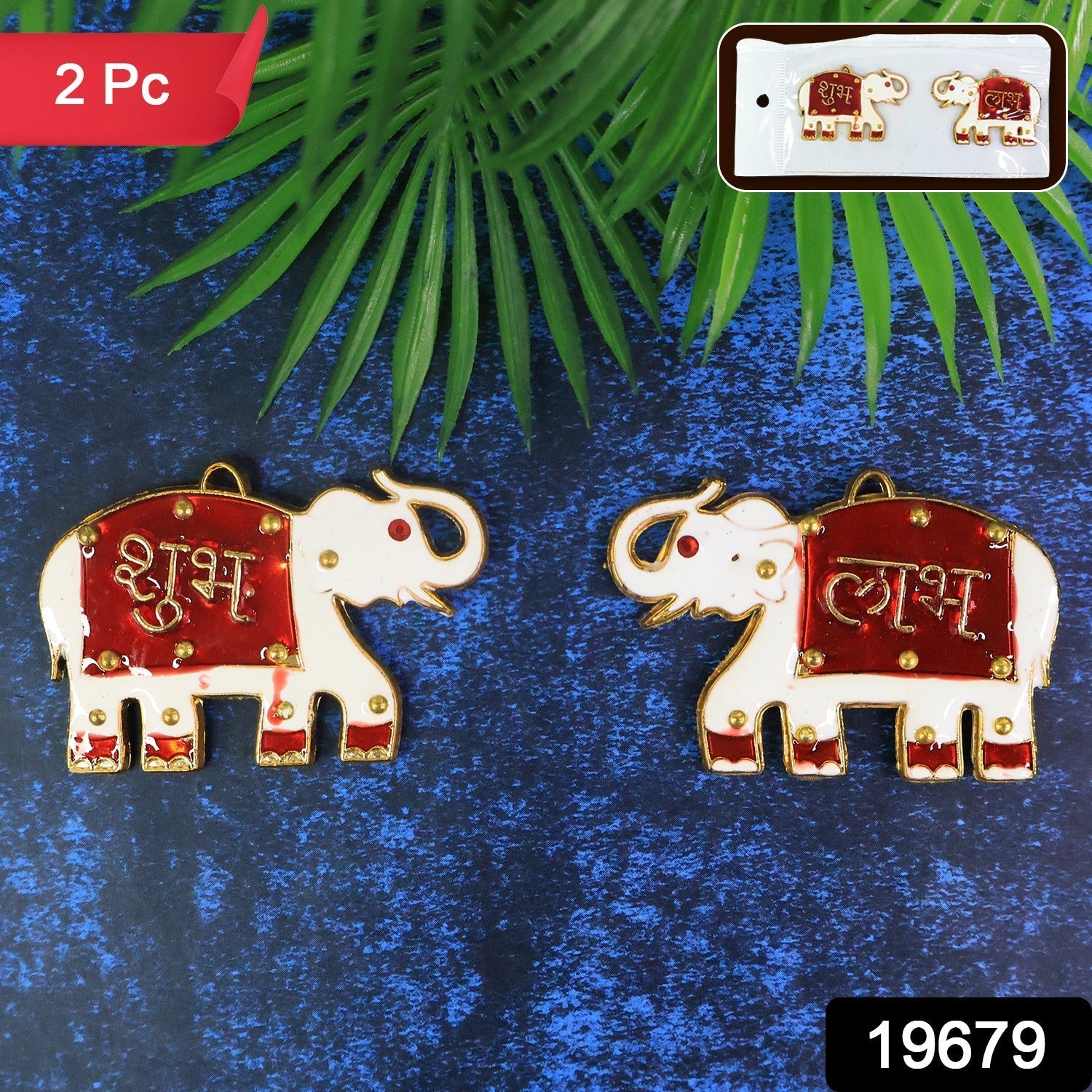 Close-up of traditional elephant shaped Shubh Labh wall hangings with golden details