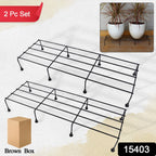 Durable metal flower plant stand in a garden setting holding vibrant pots