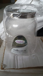 Lifestyle shot of an airtight plastic food storage jar in a modern kitchen setting.