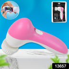 Ergonomic facial massager being used to gently cleanse the face.