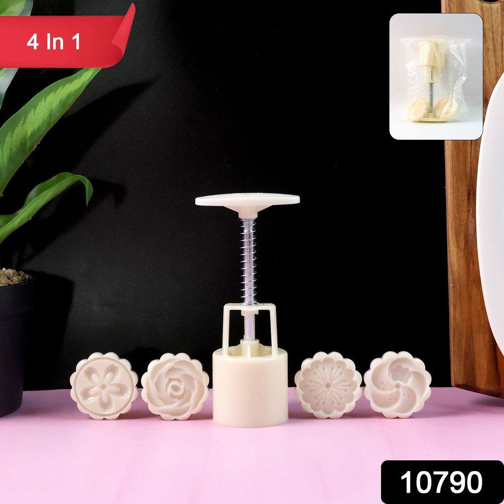 Hand pressing dough using spring press cookie mold with floral design