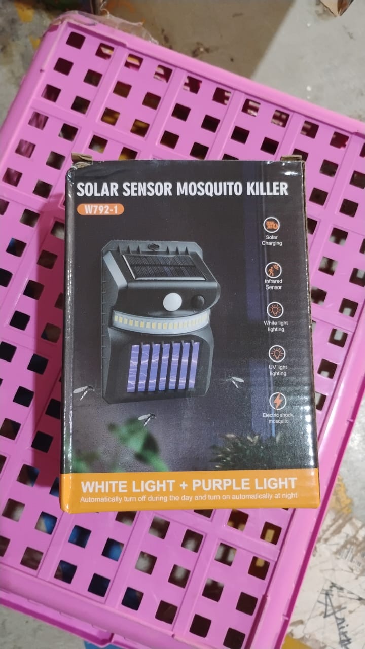 Lifestyle image of the Solar Bug Zapper providing light and pest control.