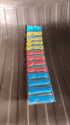 Side view of a mini paper cutter knife illustrating the smooth blade retraction.