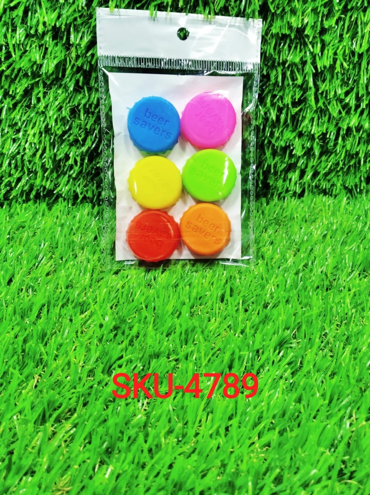 Set of six silicone bottle caps displayed neatly on a white background.