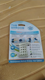 Close-up view of flexible silicone drain strainer for hair