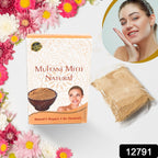 Natural Multani Mitti powder in a bowl, ready for a glowing skin treatment.