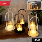 Close-up of plastic flameless LED candle lamps with flickering glow