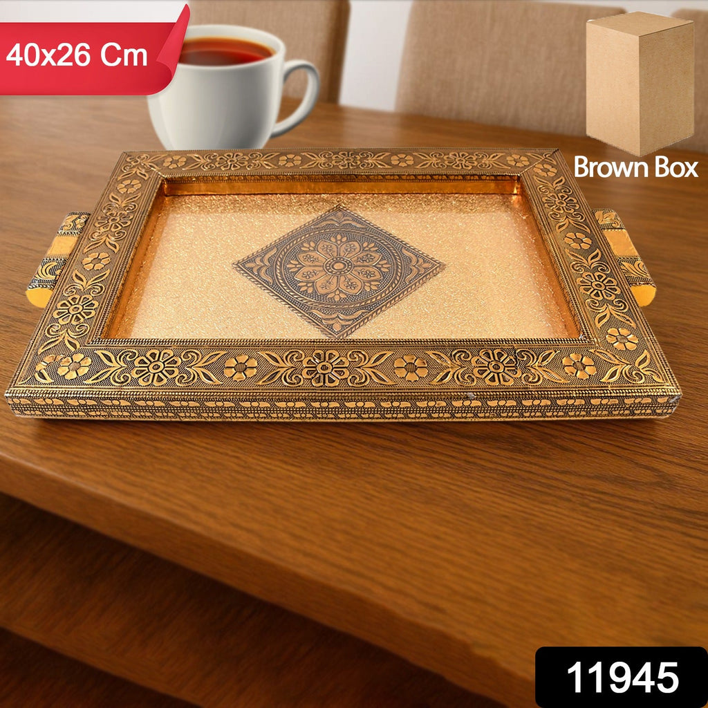 Close-up of golden floral and geometric engravings on Rajwadi serving tray
