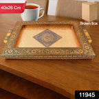 Close-up of golden floral and geometric engravings on Rajwadi serving tray