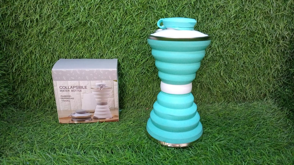 A BPA-free silicone collapsible water bottle standing on a clean surface.