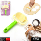 Ergonomic dough cutter roller tool with an easy-grip handle on a kitchen counter.