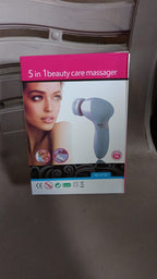 Lifestyle shot of the VelvaBloom pink facial massager in a bathroom setting.