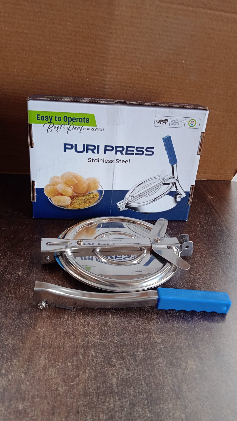 Styleva Puri Press Maker made of stainless steel with a plastic handle, displayed clearly.