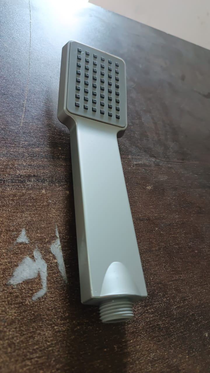 Diagram showing the easy installation of the handheld shower spray.