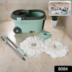 Close-up view of the Ganesh Spin Mop's microfiber head and adjustable stainless steel handle.