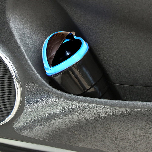 Multicolor plastic car dustbin with a spring lid, designed for easy trash disposal.