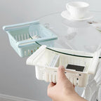 Empty adjustable fridge storage basket showcasing its clear, durable design.
