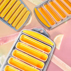 Collection of ice stick trays in various colors, ideal for any kitchen.