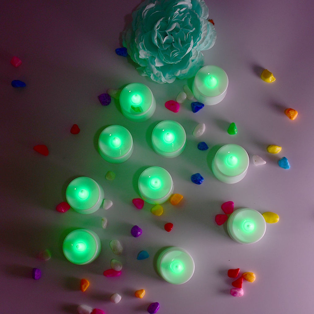Green LED decorative candles arranged for a festive display.