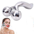 Ergonomic 3D roller face massager for gentle facial relaxation and skin contouring.
