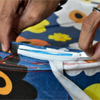 A full canvas laundry bag ready for wash day, demonstrating its utility.