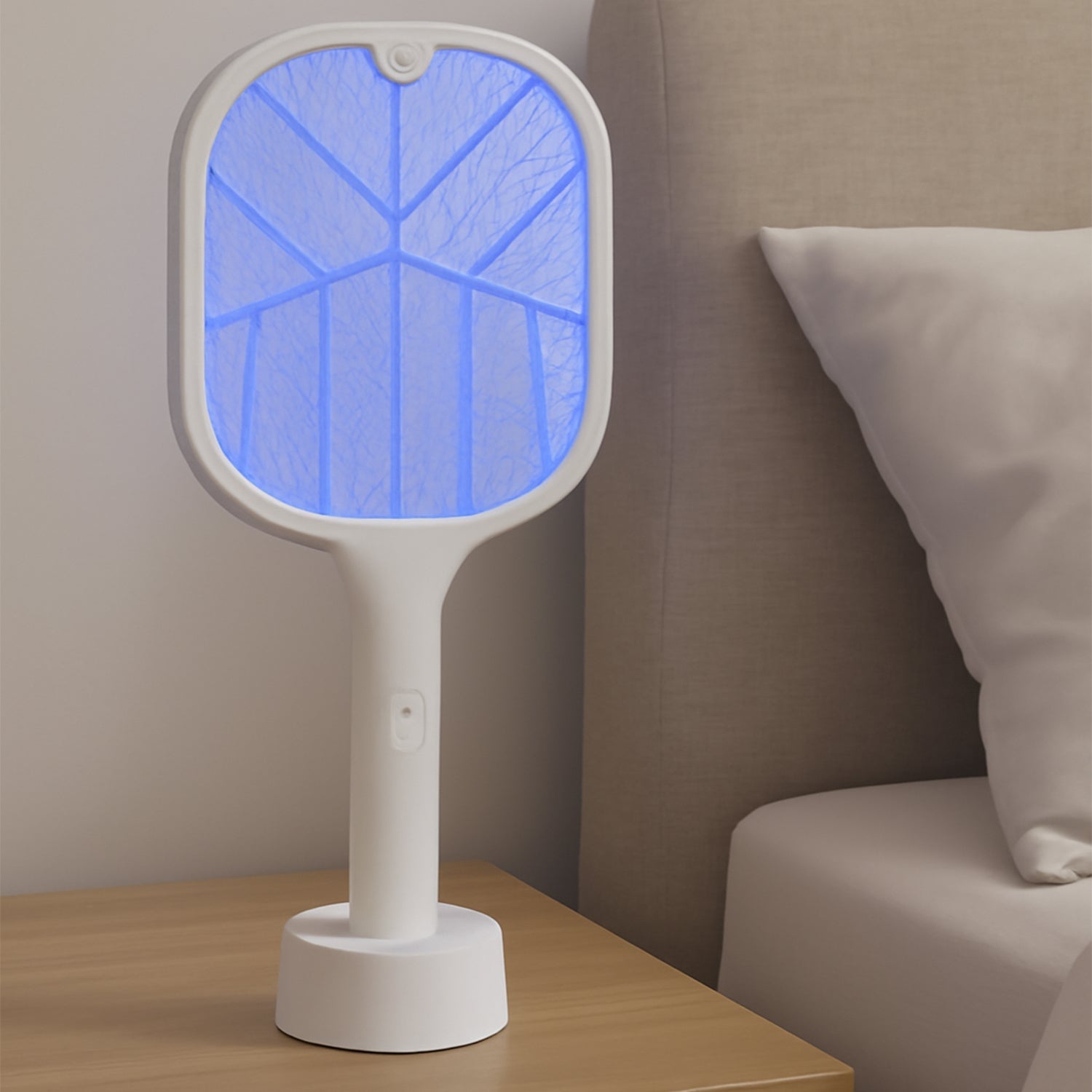 Rechargeable mosquito killer racket with UV light and USB charging base.