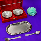 A side angle view of the silver plated serving set, emphasizing its compact and elegant presentation.