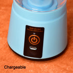 Easy-to-use juicer cup shown with various fruits for healthy smoothies.
