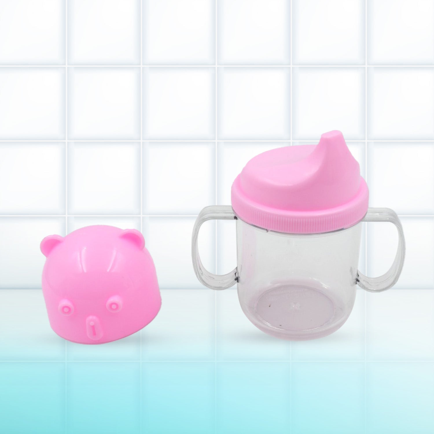 The leakproof baby mug, 250 ml capacity, shown being cleaned easily in a dishwasher.