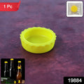 Reusable silicone bottle cap cover on glass bottle