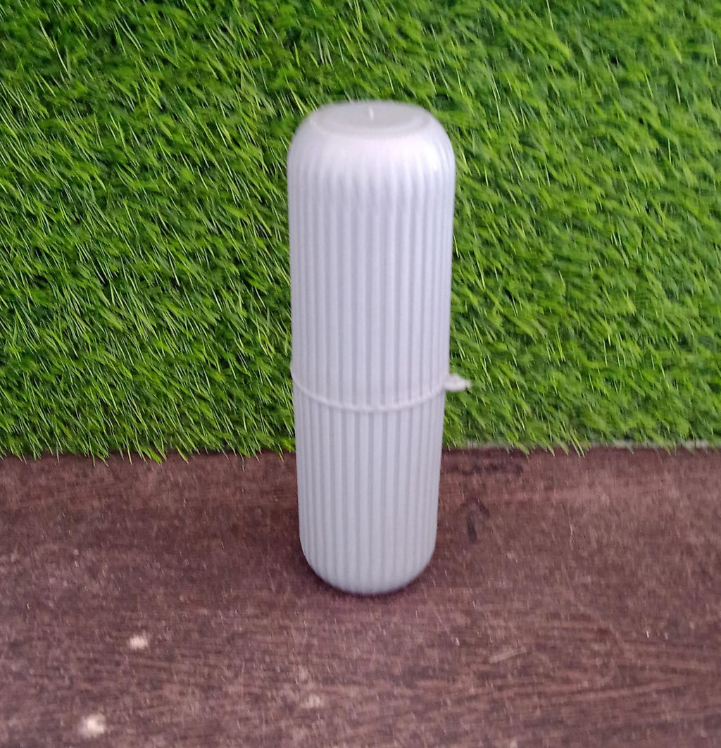 Textured capsule-shaped travel storage bottle from Organivo for secure grip.