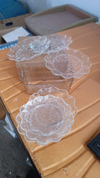 Brown box packaging used to ship 9-piece plastic bowl serving set safely