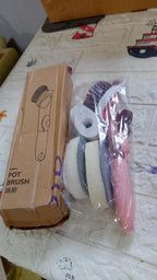 Packaging of the Soap Dispensing Dish Brush set with its handle and multiple refill heads.