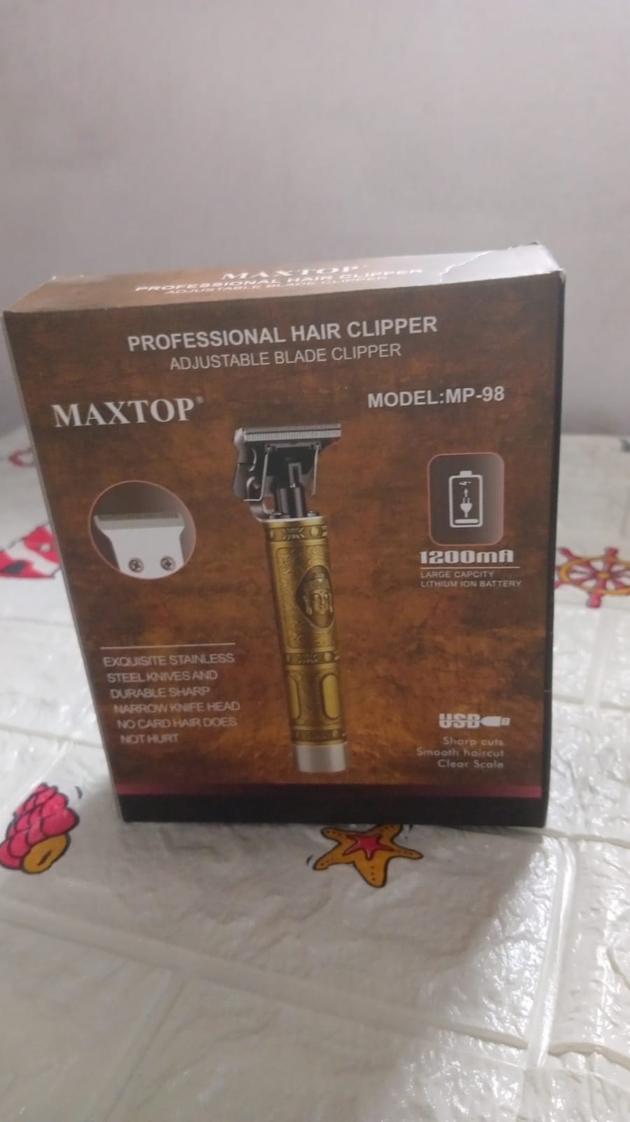 Close-up of the compact hair trimmer, ready for use.