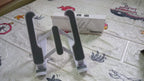 The adjustable tablet stand folded flat, ready for portability.