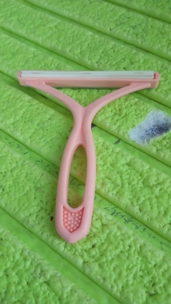 Versatile portable hair and lint remover tool for multiple fabric types.