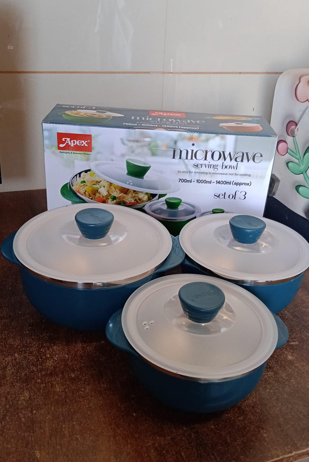 Stacked nestable microwave-safe bowl set by Apex with lids