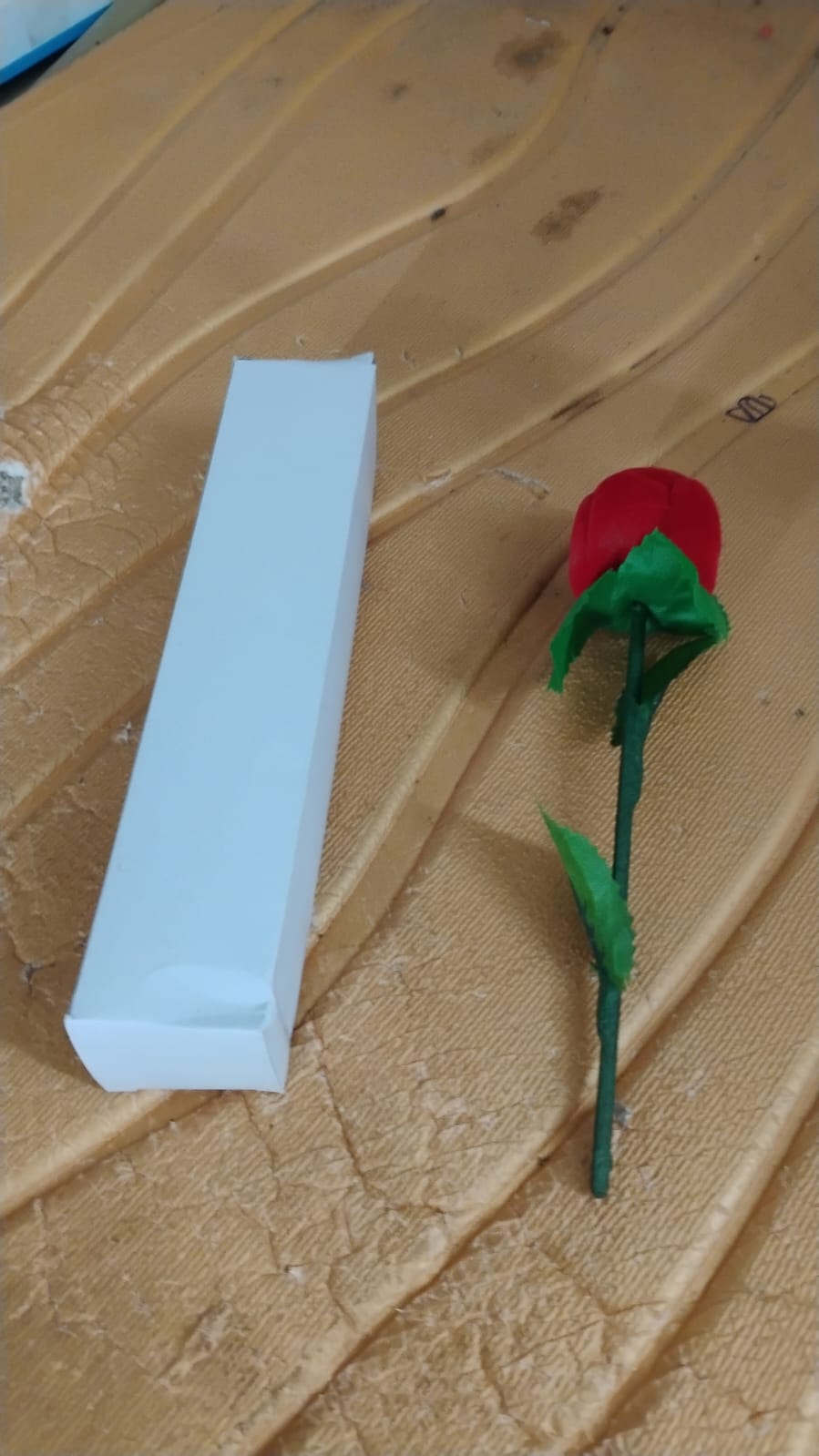 Artificial rose jewelry box with realistic stem and velvet finish