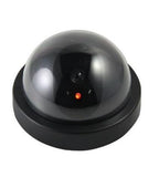 Realistic wireless dummy security camera with a visible lens for effective deterrence.