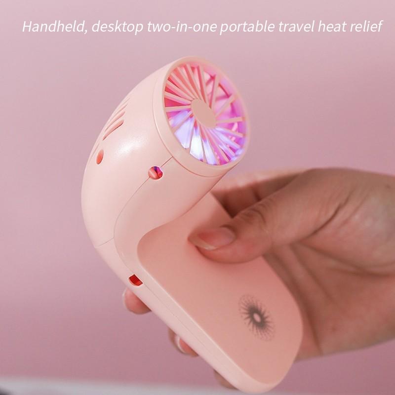 The Portable Phone Holder Fan providing a cool breeze on a hot day.