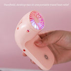 The Portable Phone Holder Fan providing a cool breeze on a hot day.
