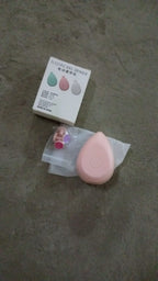 Packaging of the Baby Electric Nail Trimmer, emphasizing its safety and ease of use.